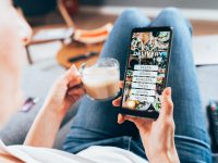 Woman ordering food online on her electronic device