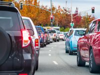 Heavy afternoon traffic in Mountain View, Silicon Valley, California; cars stopped at a traffic light